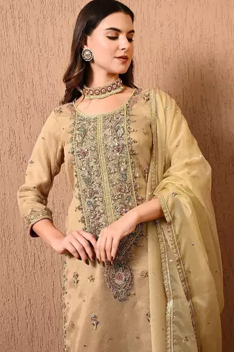 Golden green kurta set with zardozi dabka thread and sequins work