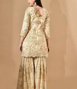 Golden sharara set with zardozi pearl & cutdana work
