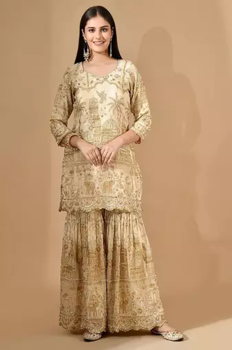 Golden sharara set with zardozi pearl & cutdana work