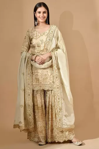 Golden sharara set with zardozi pearl & cutdana work