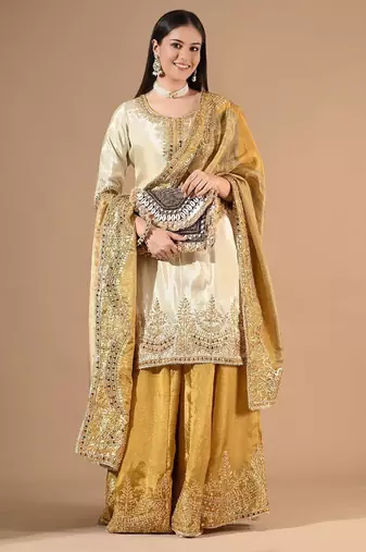 Cream yellow sharara set with gotta & mirror work