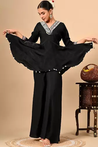 Stylish black co-ord set with thread work on umbrella flared top & bottom