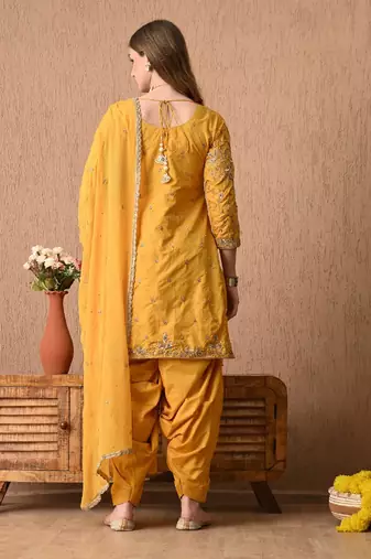 Traditional yellow kurta set with zardozi dabka sequins and tilla work