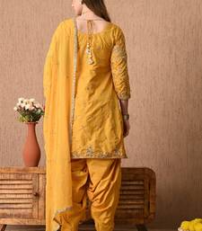 Traditional yellow kurta set with zardozi dabka sequins and tilla work