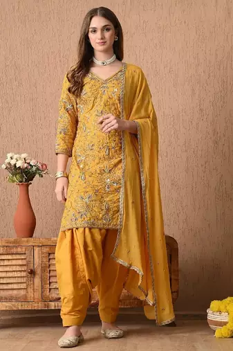 Traditional yellow kurta set with zardozi dabka sequins and tilla work