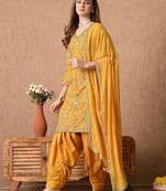 Traditional yellow kurta set with zardozi dabka sequins and tilla work