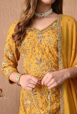 Traditional yellow kurta set with zardozi dabka sequins and tilla work 5