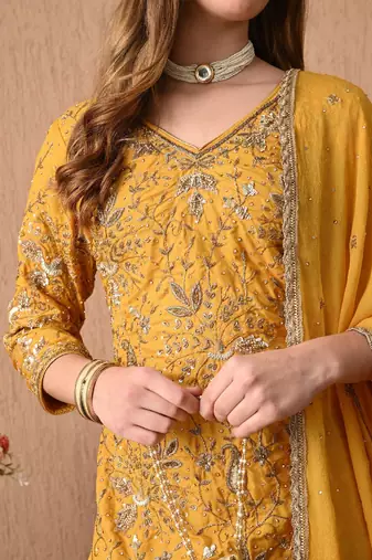 Traditional yellow kurta set with zardozi dabka sequins and tilla work