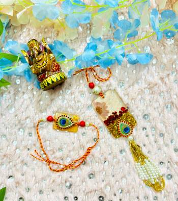 Peacock Eye Bhaiya Bhabhi Rakhi Set with Resin Floral Charm and Beaded Tassel 1