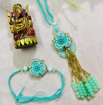 Mint Green Floral Bhaiya Bhabhi Rakhi Set with Bead Tassels & Kundan Accents 3
