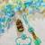 Mint Green Floral Bhaiya Bhabhi Rakhi Set with Bead Tassels & Kundan Accents