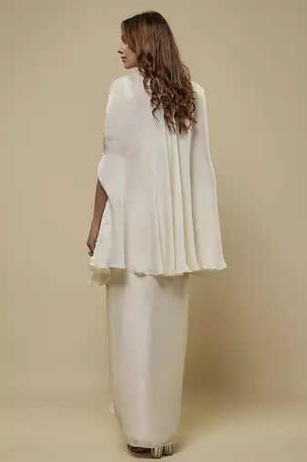 White satin plain cape and skirt paired with emobroidered blouse