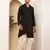 Men's black printed cotton kurta with traditional motifs