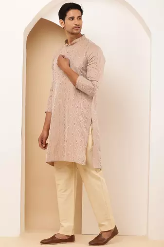 Men's light peach cotton kurta with subtle embroidery