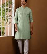 Men's green ikat printed cotton kurta with white pajama - festive ethnic wear set