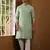 Men's green ikat printed cotton kurta with white pajama - festive ethnic wear set