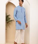 Light blue shiny kurta for men with white pyjama     party & festive wear set