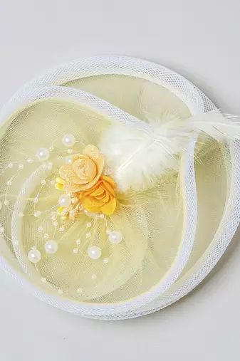 Yellow net pearl fascinator
