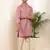 Men pink printed straight kurta with cream pyjama set