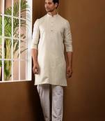 Men beige textured kurta with white pyjama set