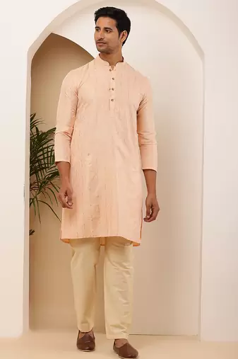 Men peach embroidered kurta with beige pyjama set