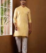 Men yellow embroidered kurta with white pyjama set