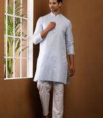 Men's light blue textured kurta with white churidar