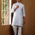 Men's light blue textured kurta with white churidar