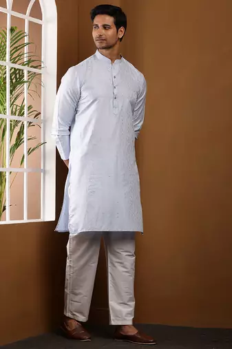 Men's light blue textured kurta with white churidar