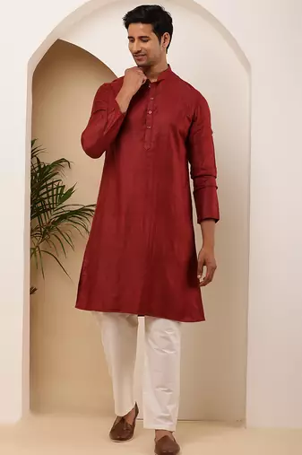 Men's maroon textured kurta with white churidar