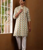 Men's cream printed festive kurta with white churidar