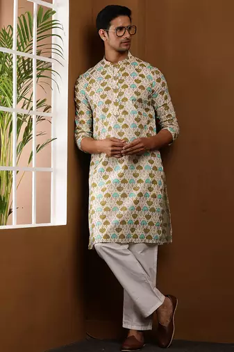 Men's cream printed festive kurta with white churidar