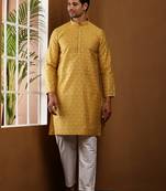 Men's mustard yellow printed kurta with white churidar