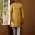 Men's mustard yellow printed kurta with white churidar