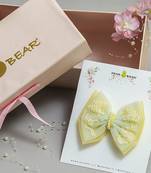 Yellow net pearl hair bow