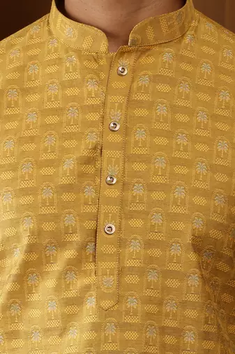 Men's mustard yellow printed kurta with white churidar