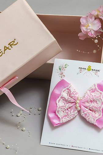 Pink pearl satin hair bow