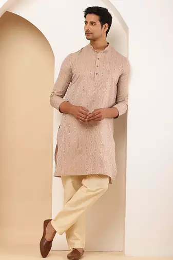 Men's beige textured kurta set with cream churidar