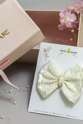 White pearl satin hair bow