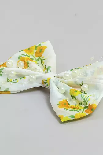 White pearl printed hair bow