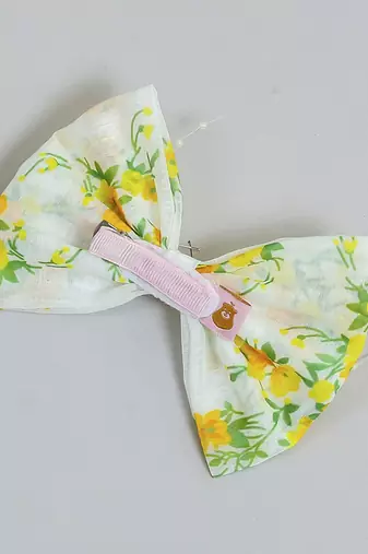 White pearl printed hair bow