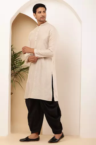 Men beige textured straight kurta with black dhoti pants set