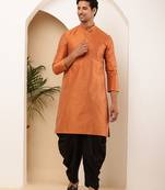 Men rust orange textured straight kurta with black dhoti pants set