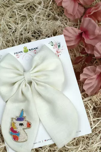 White pearl linen hair bow