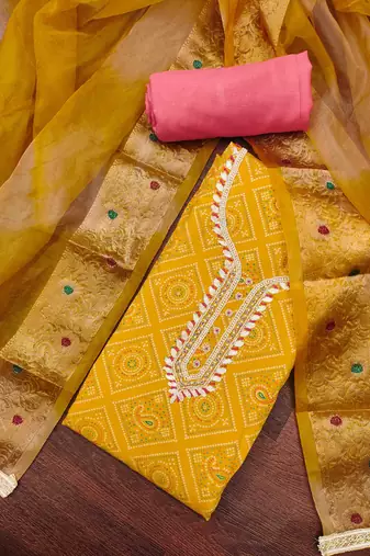 Women's yellow printed handwork dress material