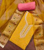 Women's yellow printed handwork dress material