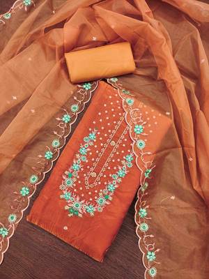Women's rust handwork dress material 1