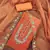 Women's rust handwork dress material