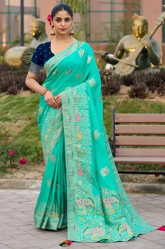 Turquoise pure dola silk jacquard woven saree with blouse
