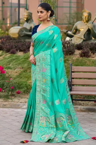 Turquoise pure dola silk jacquard woven saree with blouse